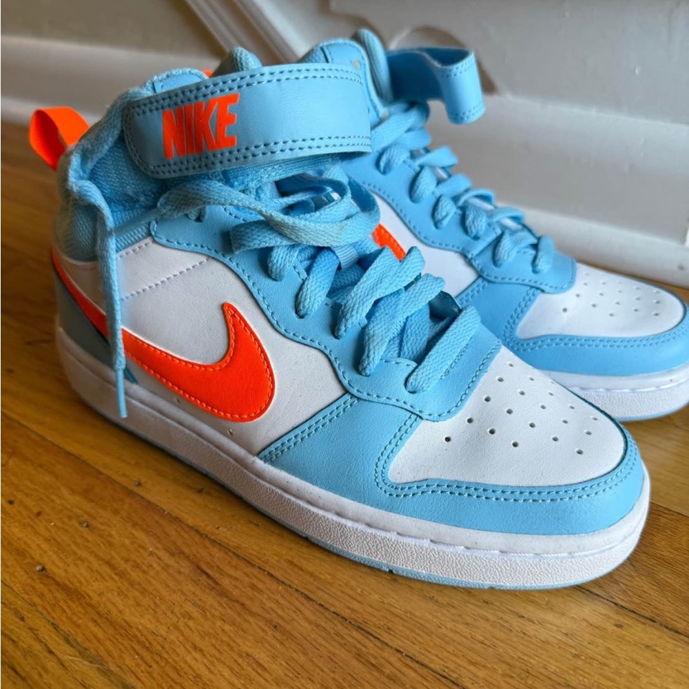 Nike Sky Blue Sneakers with Orange Accents